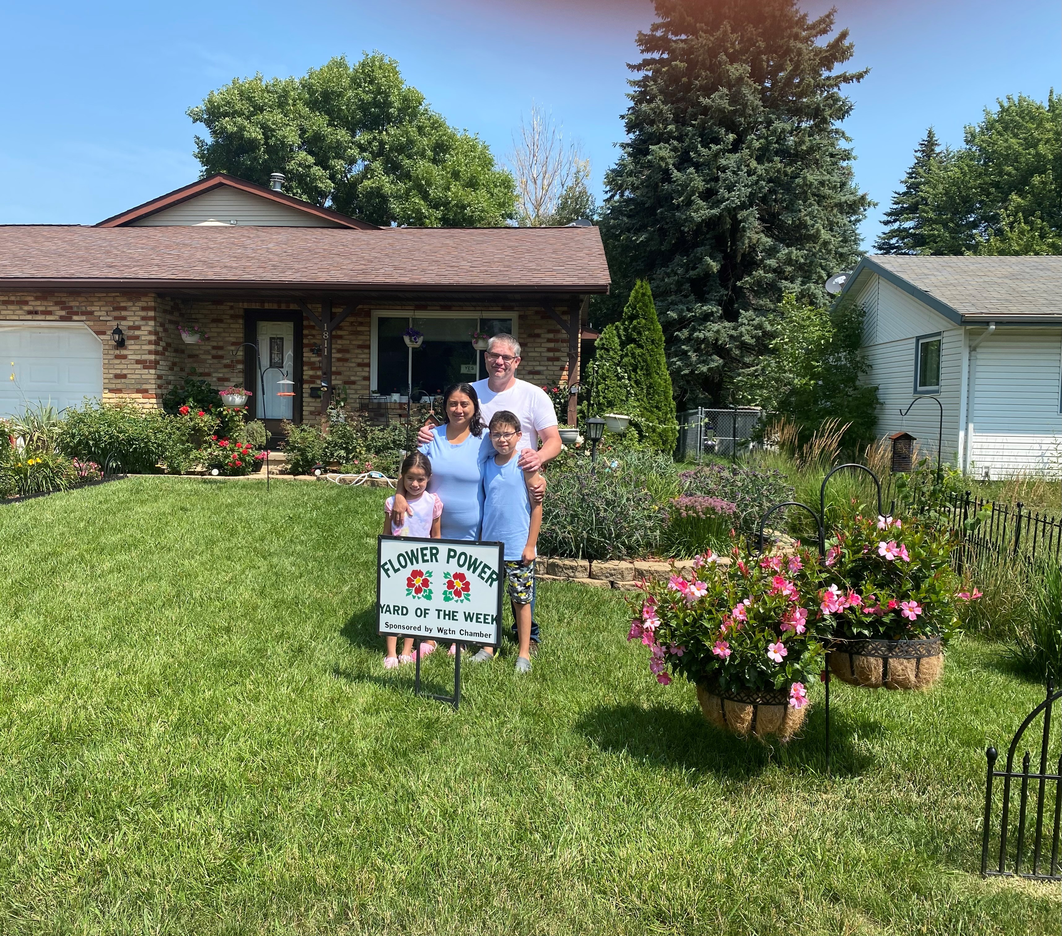 Sauer family has Flower Power Yard of the Week - Vimarsana News